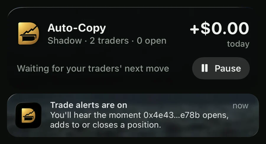 An iPhone Lock Screen with the Desk Live Activity and a notification: Trade alerts are on